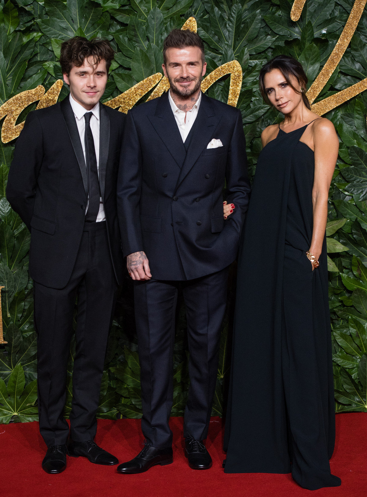 Дэвид, Виктория и Бруклин Бекхэмы